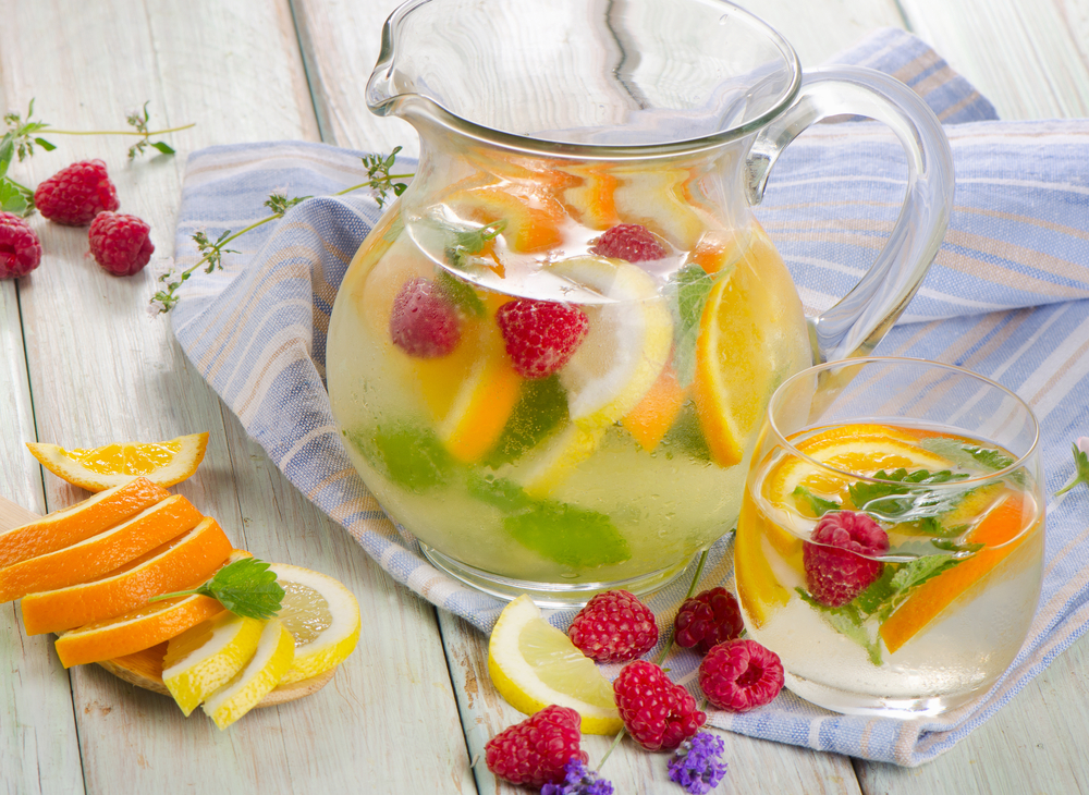 Fruit drink with fresh berries and mint leaves. Selective focus