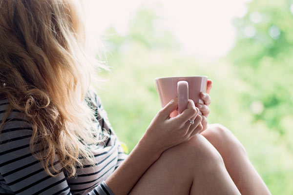 woman drinking coffee