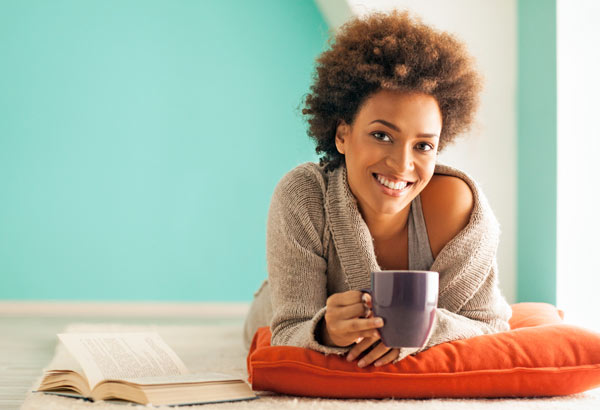 woman reading with coffee